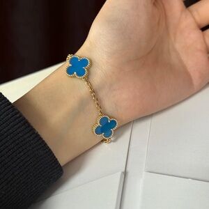 Van Cleef & Arpels Gold Bracelet with Blue Clover Charms